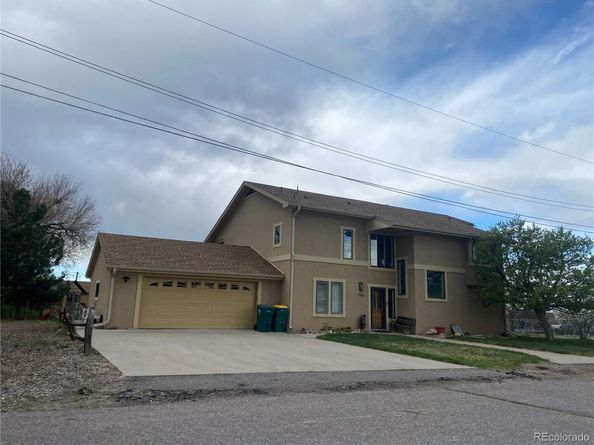 1123 S Quince Way, Denver CO 80231