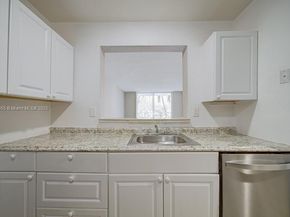498 NW 165th St Rd D206, Miami FL 33169
