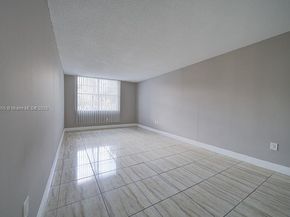 498 NW 165th St Rd D206, Miami FL 33169