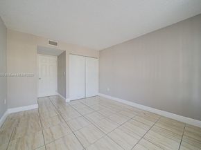 498 NW 165th St Rd D206, Miami FL 33169