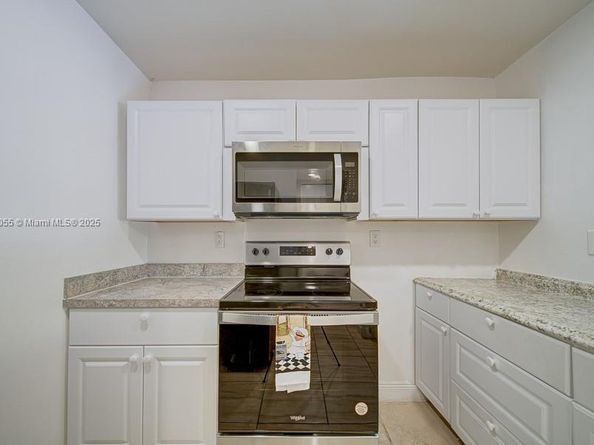 498 NW 165th St Rd D206, Miami FL 33169