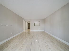 498 NW 165th St Rd D206, Miami FL 33169