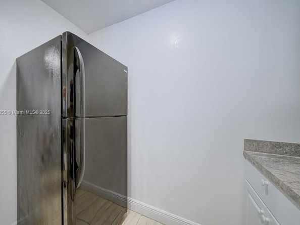 498 NW 165th St Rd D206, Miami FL 33169