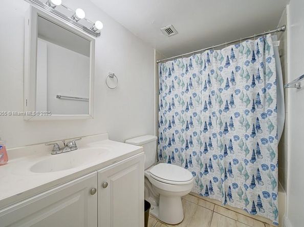 498 NW 165th St Rd D206, Miami FL 33169