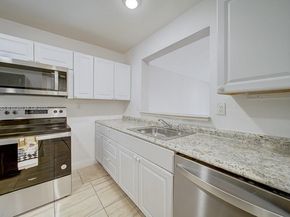 498 NW 165th St Rd D206, Miami FL 33169