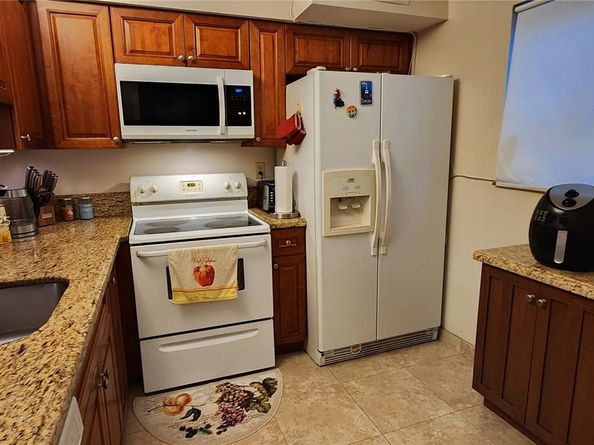 111 Gardens Dr 203, Pompano Beach FL 33069