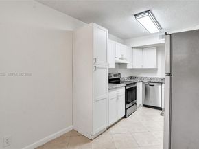8721 Wiles Rd 101, Coral Springs FL 33067