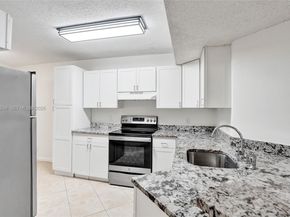 8721 Wiles Rd 101, Coral Springs FL 33067
