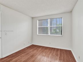 8721 Wiles Rd 101, Coral Springs FL 33067