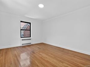 96-11 65th Road 313, Rego Park NY 11374