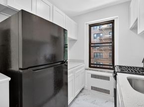 96-11 65th Road 313, Rego Park NY 11374