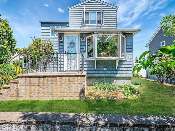 211 Saint Marks Place, East Meadow NY 11554
