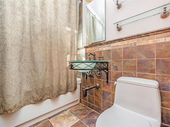 Undisclosed Address #936941, Middle Village NY 11379