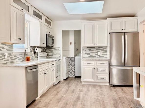 8 Fox Hollow Lane, Ridge NY 11961