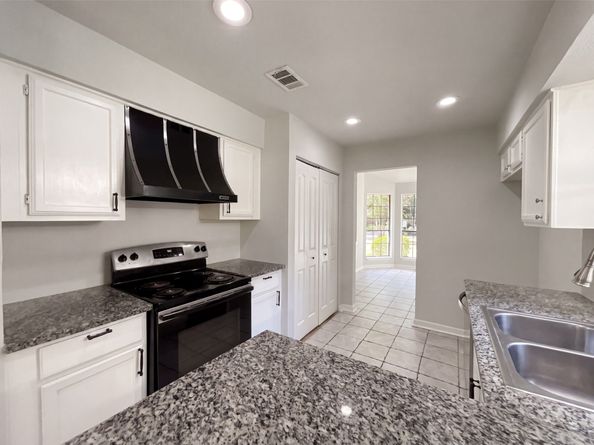 4911 Creek Shadows Drive, Houston TX 77339
