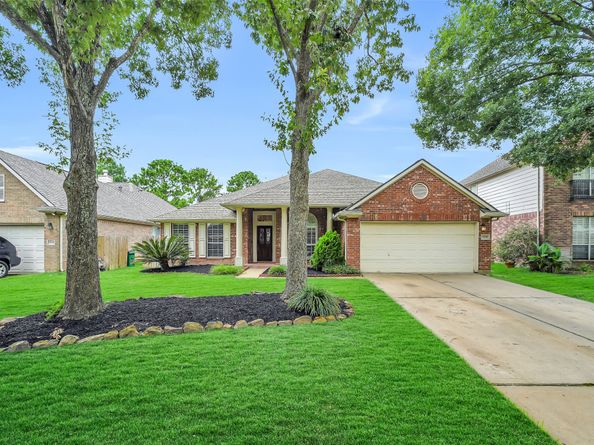 11219 Timbercreek Falls Drive, Houston TX 77095