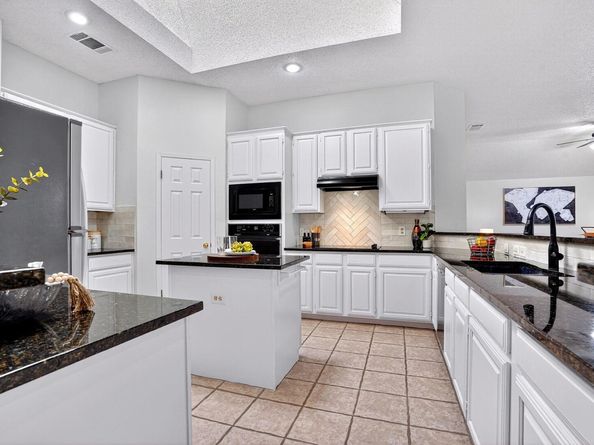 9018 Marthas DR, Austin TX 78717