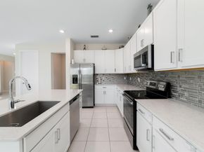 1310 Whitcombe Drive, Royal Palm Beach FL 33411
