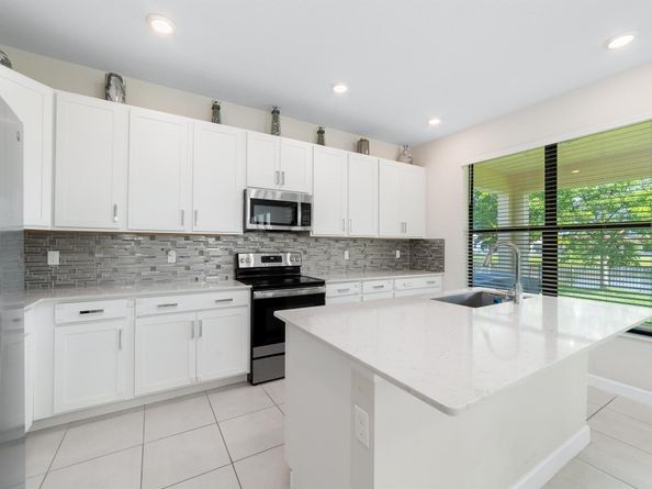 1310 Whitcombe Drive, Royal Palm Beach FL 33411