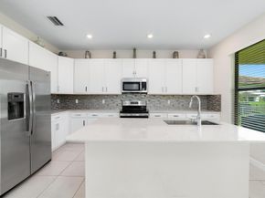 1310 Whitcombe Drive, Royal Palm Beach FL 33411