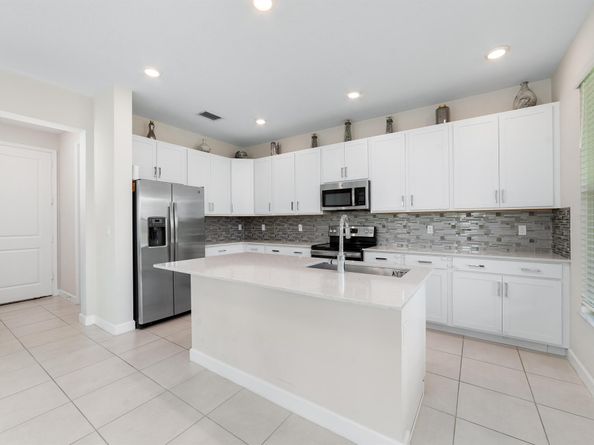 1310 Whitcombe Drive, Royal Palm Beach FL 33411