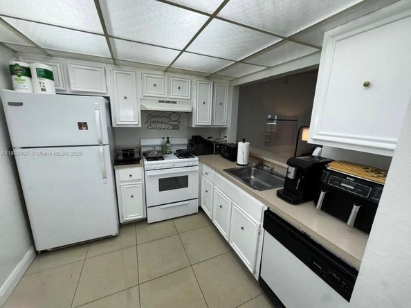 18111 NW 68th Ave F203, Hialeah FL 33015