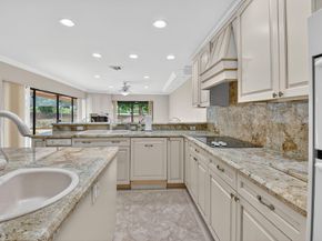 5884 Pinebrook Drive, Boca Raton FL 33433