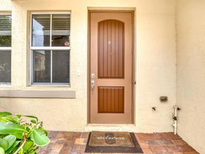 8332 Cocoplum Sound Lane, West Palm Beach FL 33411