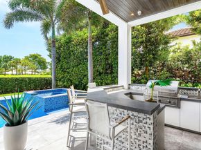 1576 Thatch Palm Drive, Boca Raton FL 33432