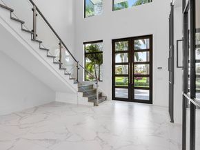1576 Thatch Palm Drive, Boca Raton FL 33432
