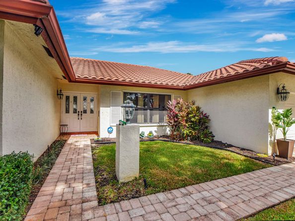 243 Woodlake Circle, Deerfield Beach FL 33442