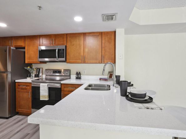 5051 Wiles Rd 201, Coconut Creek FL 33073