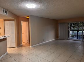 8701 Wiles Rd 203, Coral Springs FL 33067