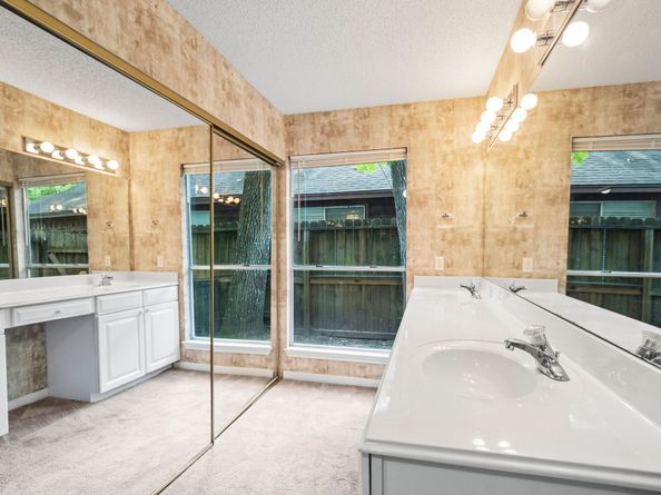 22 S Rain Forest Court, The Woodlands TX 77380
