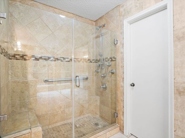 22 S Rain Forest Court, The Woodlands TX 77380