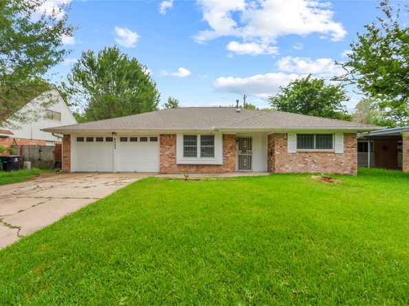 8203 Braes River Drive, Houston TX 77074