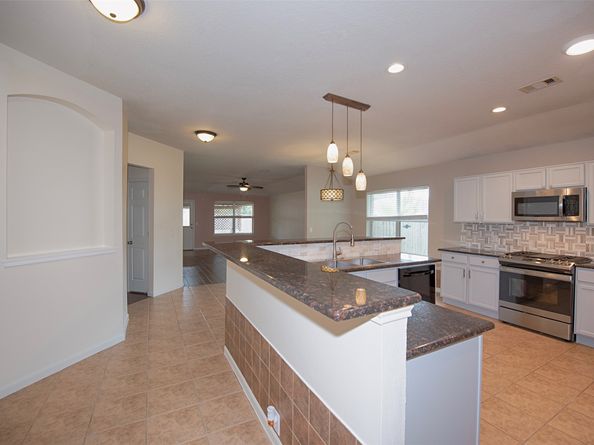 2753 Foster Hill Drive E, Houston TX 77345