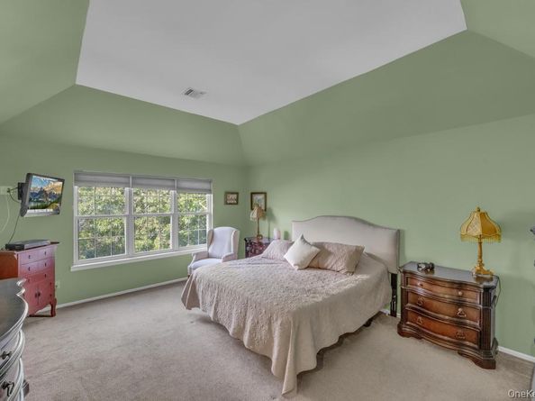 22 Whispering Woods Drive, Smithtown NY 11787
