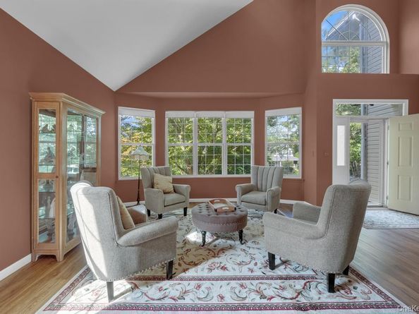 22 Whispering Woods Drive, Smithtown NY 11787