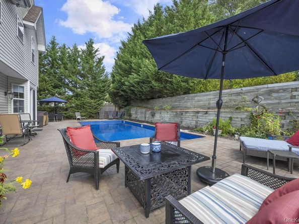 22 Whispering Woods Drive, Smithtown NY 11787