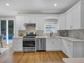 22 Whispering Woods Drive, Smithtown NY 11787