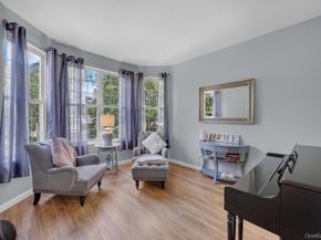 22 Whispering Woods Drive, Smithtown NY 11787