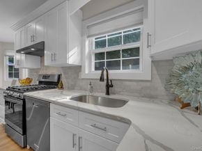 22 Whispering Woods Drive, Smithtown NY 11787