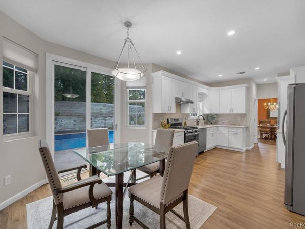 22 Whispering Woods Drive, Smithtown NY 11787