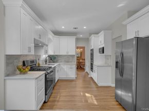 22 Whispering Woods Drive, Smithtown NY 11787