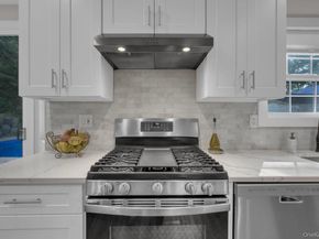 22 Whispering Woods Drive, Smithtown NY 11787