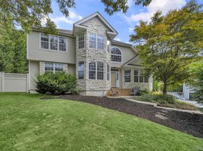 22 Whispering Woods Drive, Smithtown NY 11787