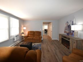 65A Village Circle W, Manorville NY 11949