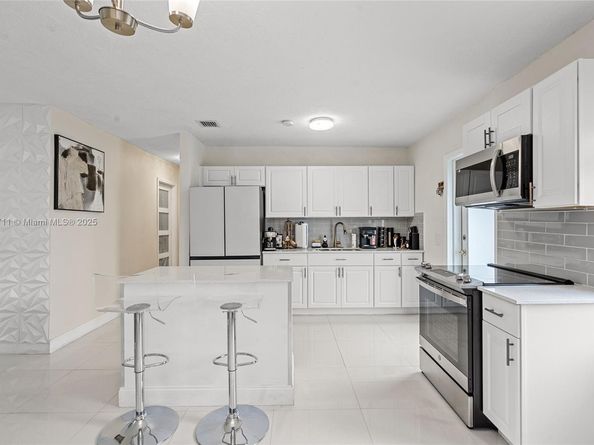 9251 Little River Blvd, Miami FL 33147