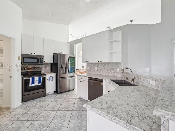 5708 NW 47th Ct, Coral Springs FL 33067